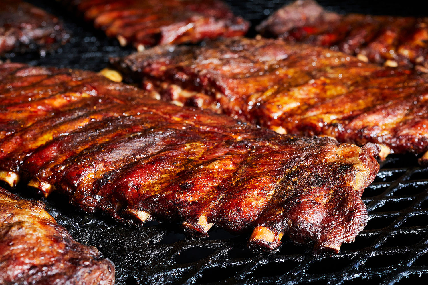 St. Louis Cut Pork Ribs rubbed with our Happy Sprinkles Dry Rub, then wood-smoked long and low until perfectly tender.